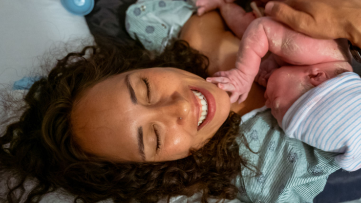 newborn baby with mother